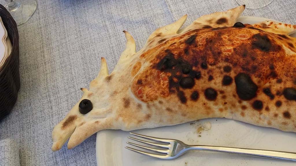 My ham, tomato and mozzarella calzone, shaped like a fish. Because why not?