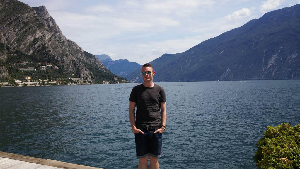 Standing before the stunning mountains surrounding Lake Garda