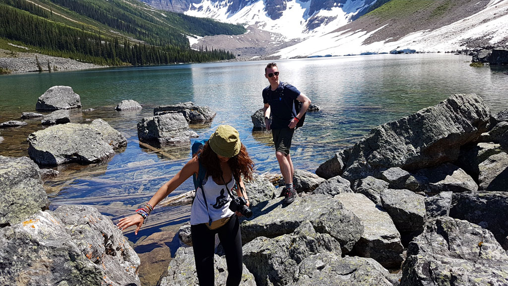 My friend and I navigating the rocky shores of the Lower Consolation Lake to get that picture-perfect view point.
